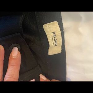 Jet black raw Baldwin jeans